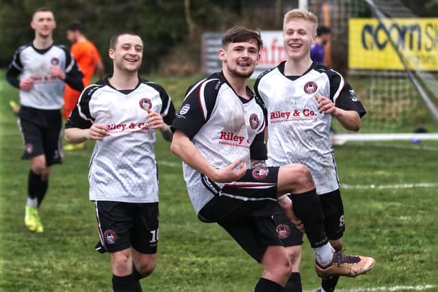 Ingram celebrates his penalty winner. Photo by Paul Neal.