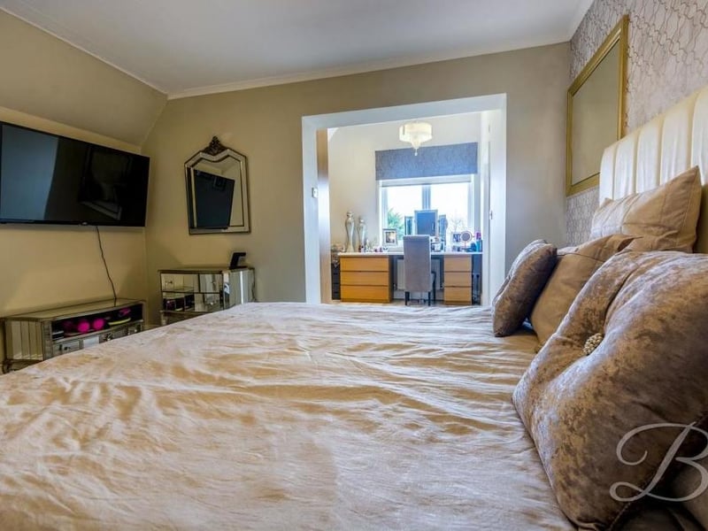 A second image of the main bedroom, which offers so much, including a dressing-table area.