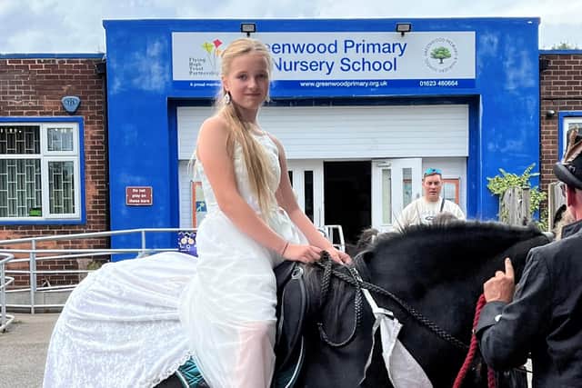 Alice Moore arrived at the ceremony on horseback