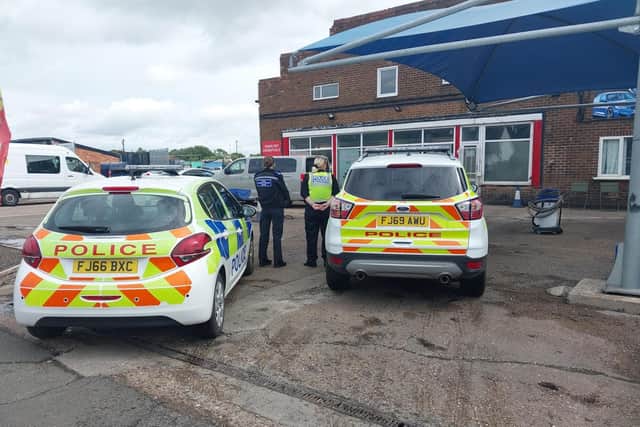 Police and immigration officers attended Shirebrook Shiny Hand Car Wash, Langwith Road, Shirebrook, following reports of people working illegally. (Photo by: Derbyshire Police)