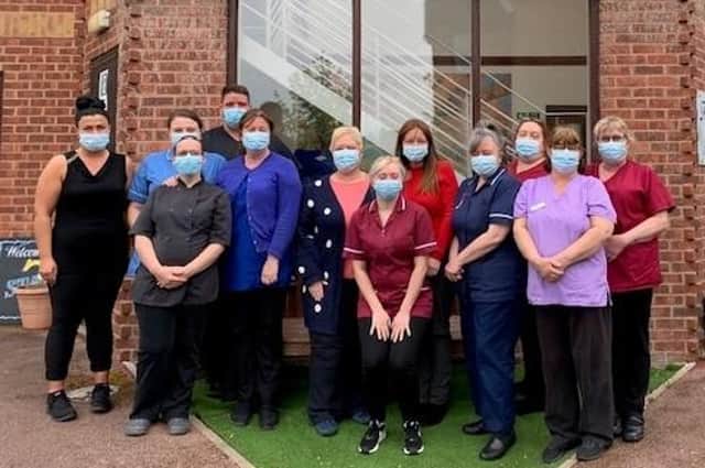 Staff at Alexandra Care Home pictured back in May this year.