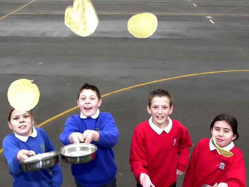 Tickhill St Mary's Church of England and Estfeld Primary Schools competeted against each other in a series of pancake at St Mary's in 2004. Our picture shows winning pupils, from left, St Mary's pupils James Morley, aged 11, and Chloe Sigsworth, aged ten, and Estfeld pupils James Kilvington, aged 11, and Emma Cowan, aged ten.