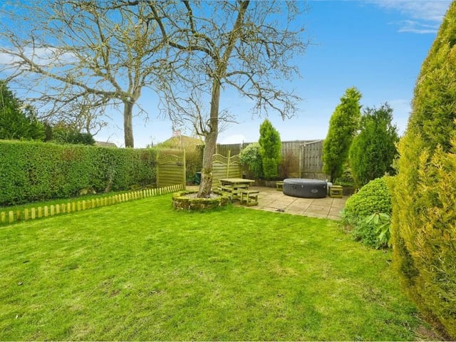 Step into the impressive garden that beckons for outdoor enjoyment.