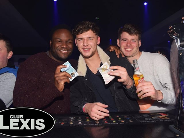 Flashing some cash at the bar