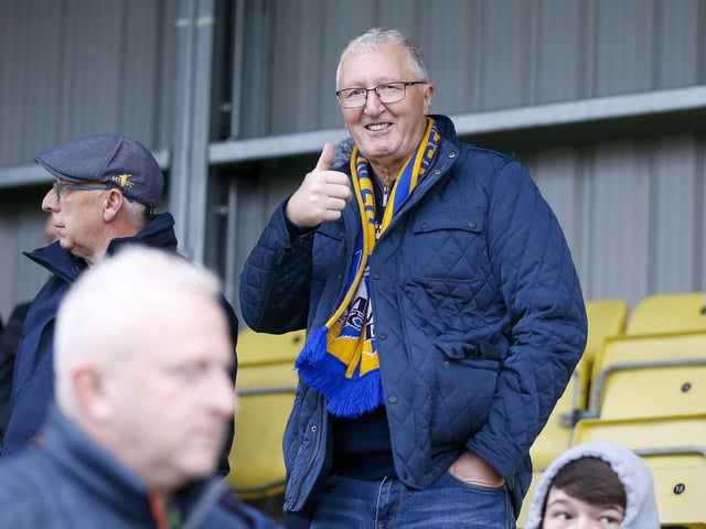 Mansfield fans at The EnviroVent Stadium for the match against Harrogate Town.