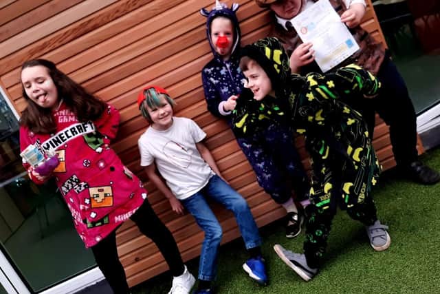 Some students chose to wear non-uniform or pyjamas, along with make-up and temporary tattoos.