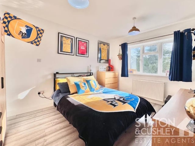 The property features four generous bedrooms perfect for a growing family.