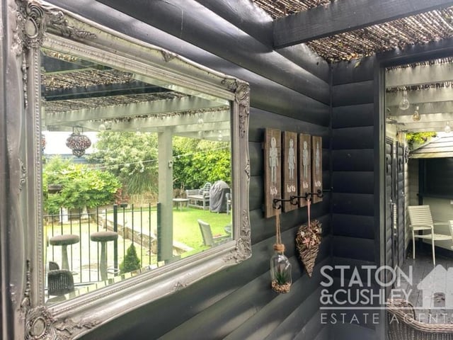 One if the main features of the rear garden at the £725,000 property is a summer house. Fittingly, it has a very independent design.