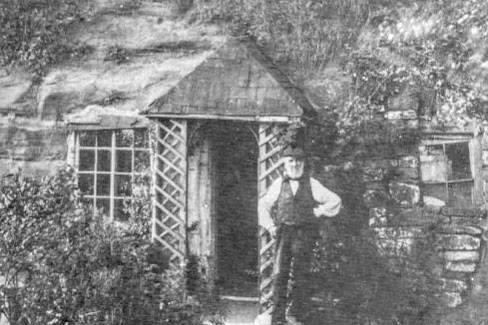 Angela Roche is the great-great granddaughter of John Bramwell, the last-known cave dweller of the rock houses, which are cut out of the sandstone on Rock Hill in Mansfield. We have searched the archives and been given permission to share some fantastic photographs from Angela’s collection which show the rock houses through the years. Unfortunately the landslide in November 2019 has meant the condition of the rock houses is currently unknown, as work is ongoing to secure the rock face. This is part of our local history. Photo: John Bramwell, the last known rock house inhabitant outside his Mansfield property in 1894.
