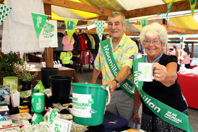 Roger and Carole Smart volunteer fundraisers for Macmillan held a stall on Chesterfield Market in 2011 for the worlds biggest coffee morning event.