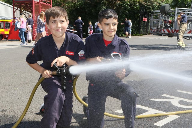 Fire Cadets Josh Clarke and Bentley Mohammed test out the hoses.