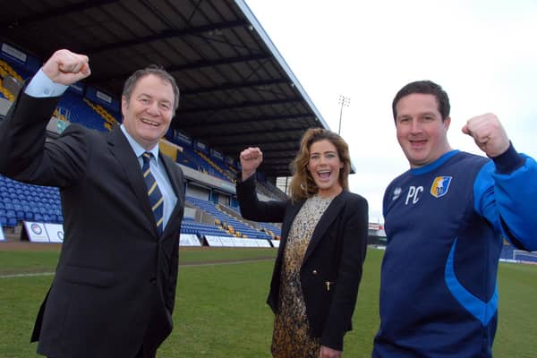Chairman John Radford, Chief Executive Officer Carolyn Radford and boss Paul Cox on their way to guided Stags back into the EFL..