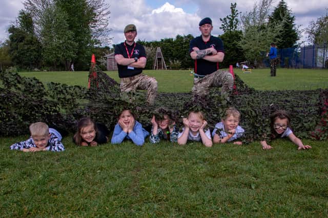 Mapplewells Primary and Nursery School children with members of the Desert Rats engagement team.