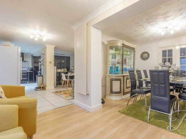 The open-plan kitchen/diner also contains a comfortable living and entertaining area that flows into the dining room
