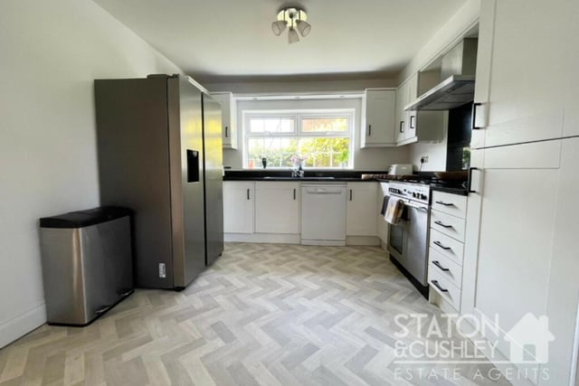 Next stop is the spacious kitchen/diner, which boasts an integrated range cooker with gas hob and overhead extractor, integrated dishwasher and space for a fridge/freezer. Other assets are fitted wall and base units, drawers, roll-edge worktops and a sink and drainer with mixer tap.