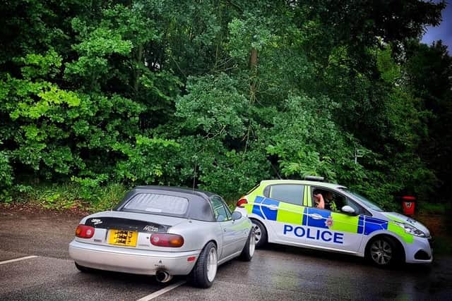 Officers from Derbyshire Police's Shirebrook safer neighbourhood team approached the driver of a classic convertible Mazda Miata after they spotted the car driving in an anti-social manner and doing donuts in a car park. (Photo by: Derbyshire Police)