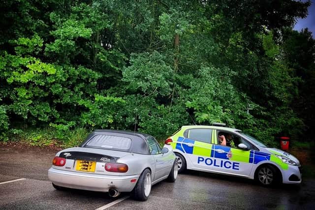 Officers from Derbyshire Police's Shirebrook safer neighbourhood team approached the driver of a classic convertible Mazda Miata after they spotted the car driving in an anti-social manner and doing donuts in a car park. (Photo by: Derbyshire Police)
