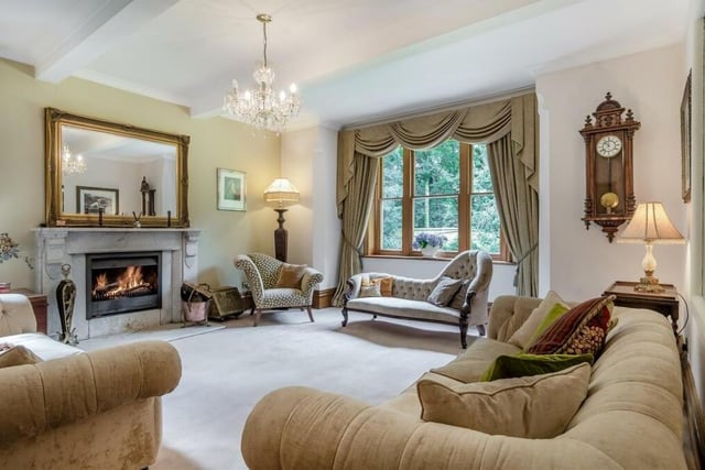The first of four reception rooms to take a look at is this delightful, good-sized living room with triple section sash window overlooking the garden and another window at the back.