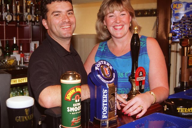 Landlord and Landlady George and Alison Micalles behind the bar the Mason Arms in 1997