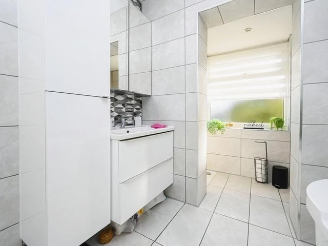 The bathroom from a different angle. It is so attractive and modern -- in keeping with the rest of the £290,000 property.