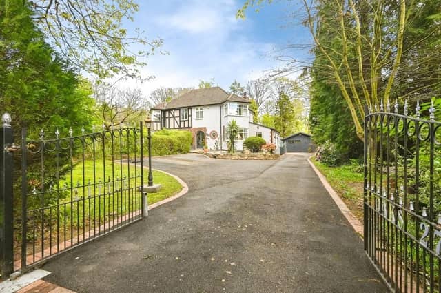 The stunning property is tucked away behind electric gates and boasts a well maintained front garden and ample off-road parking for multiple cars/caravan