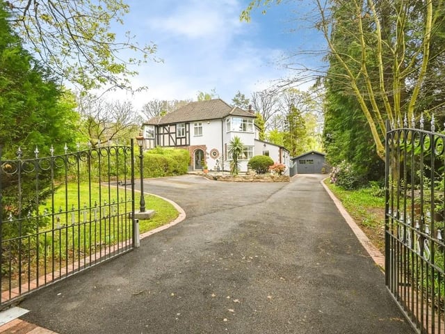 The stunning property is tucked away behind electric gates and boasts a well maintained front garden and ample off-road parking for multiple cars/caravan