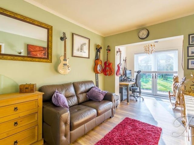 Another example of how the bedrooms can be transformed for multiple uses. This one is currently being used as an office, and boasts a set of French doors that lead out to the back garden.