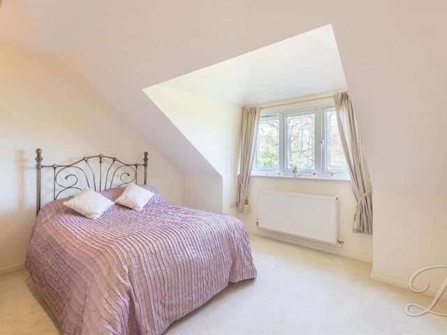 Cute and stylish is the best way to describe this fourth first-floor bedroom. There is a carpeted floor, downlights and a double-glazed window overlooking the back of the house.
