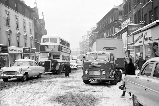 Drivers cautiously dealing with snow and ice in Leith Street in 1960.