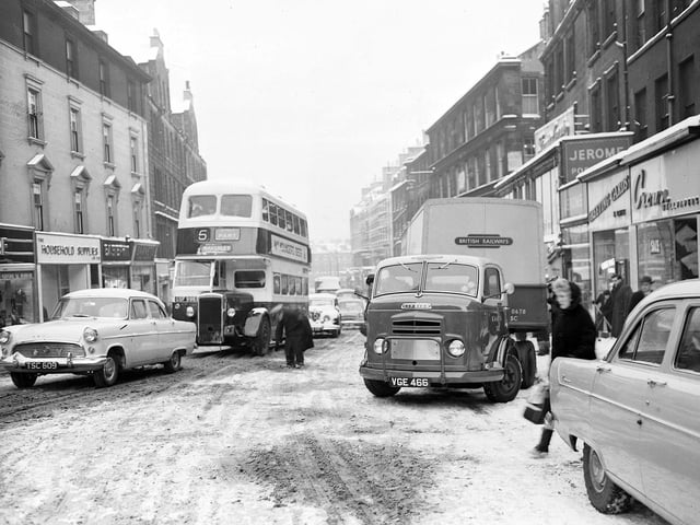 Drivers cautiously dealing with snow and ice in Leith Street in 1960.