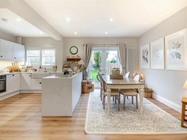 A wonderfully refurbished, L-shaped, open plan family living space with defined kitchen, dining and living areas - perfect for family life.