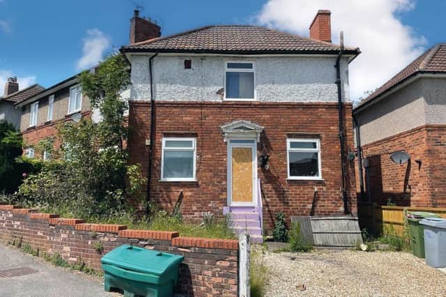 The four-bedroom semi-detached house on Haywood Avenue, Blidworth that is up for sale via online auction after being damaged by fire.