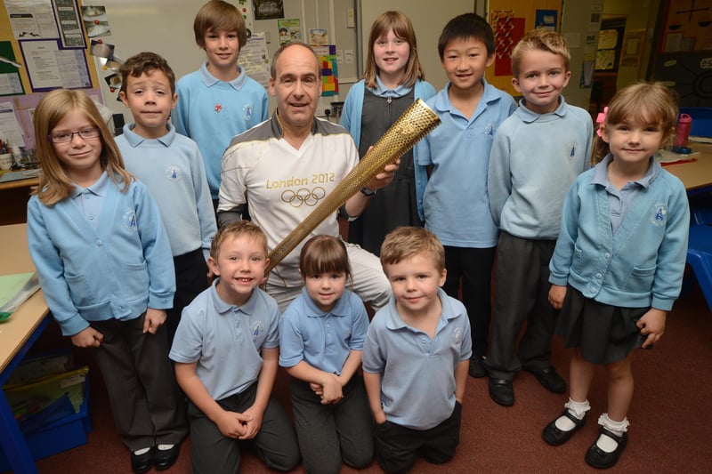 Pupils at St Anne's Primary School had the chance to see Tony Eaton's Olympic torch.