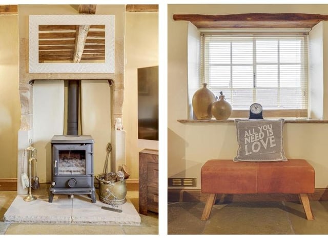 Two pleasant features that capture the essence of the living room at the £375,000 Linby cottage -- its fireplace and its sash window.