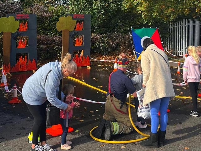 Youngsters could try their hand with fire hoses.