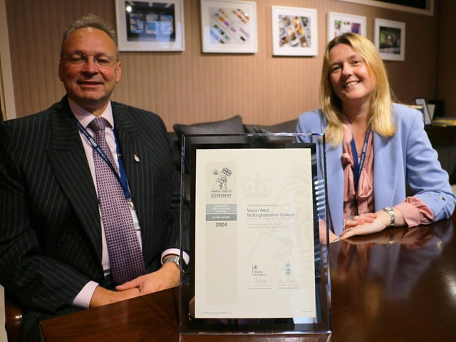 Principal Andrew Cropley and director of human resources Sian Geeson with the Armed Forces Covenant Silver Award