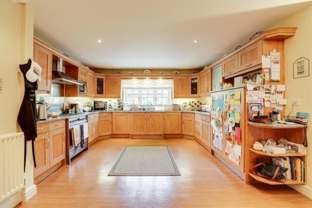 The spacious, classy kitchen includes a whole host of integrated appliances, including a microwave, fridge, freezer and dishwasher, not to mention a free-standing range cooker with a gas hob. A range of fitted base and wall units, with Granite worktops and under-cabinet lighting, adds to the room's appeal.