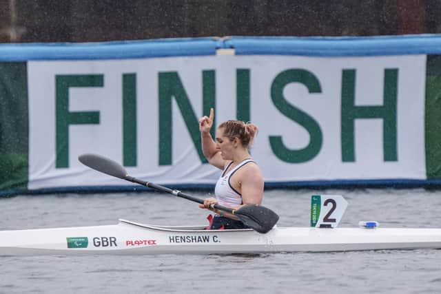 Charlotte Henshaw reacts after winning her heat of the canoe sprint women's kayak single (KL2 200m).