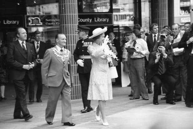 Coun George Jelley accompanies the Queen after she had officially opened Mansfield's new public library.