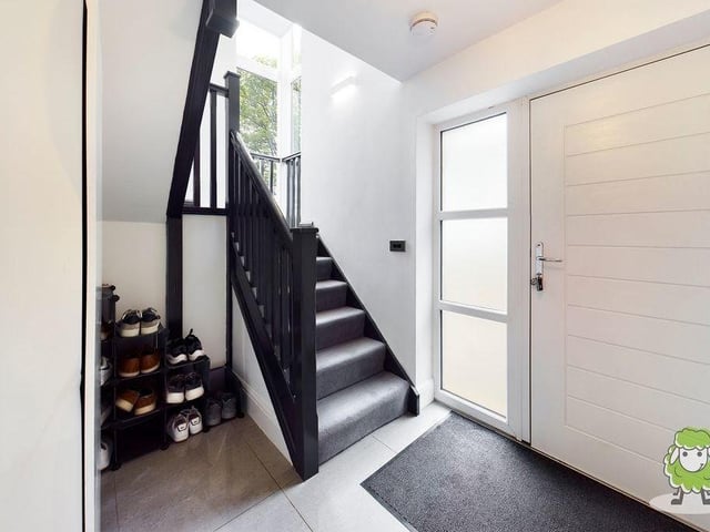 Through the front door and into this pleasant entrance hall. But before we nip upstairs, let's take a look round the ground floor.