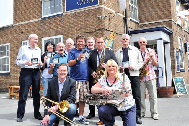 Tenant of The Park Inn, Rick Hanlon (centre), and Mick Donnelly with fellow members of Musicians Unlimited who were celebrating in 2012 after raising £12,000 through their sponsored album. Does this bring back happy memories?