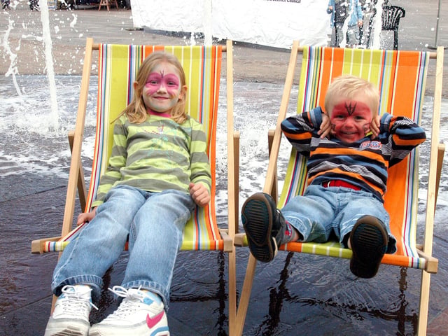 Katie Wagstaff and Tyler Wagstaff taking a well earned rest at the Mansfield street party held in Mansfield Market Place, 2007.