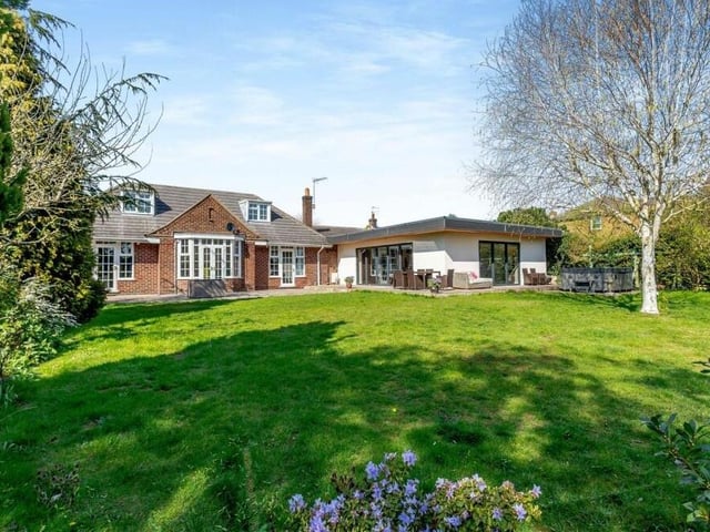 An attractive view from the garden of the rear of the five-bedroom dormer bungalow.
