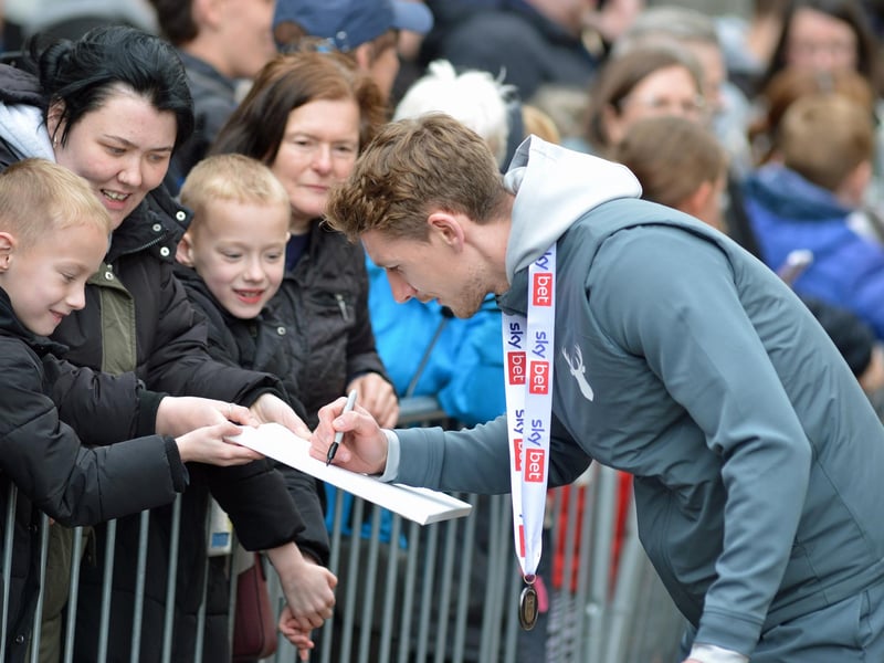 Crowds packed into Mansfield town centre this afternoon to salute their heroes.