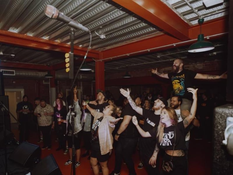 Crowds singing along to Killing Aura's live set.