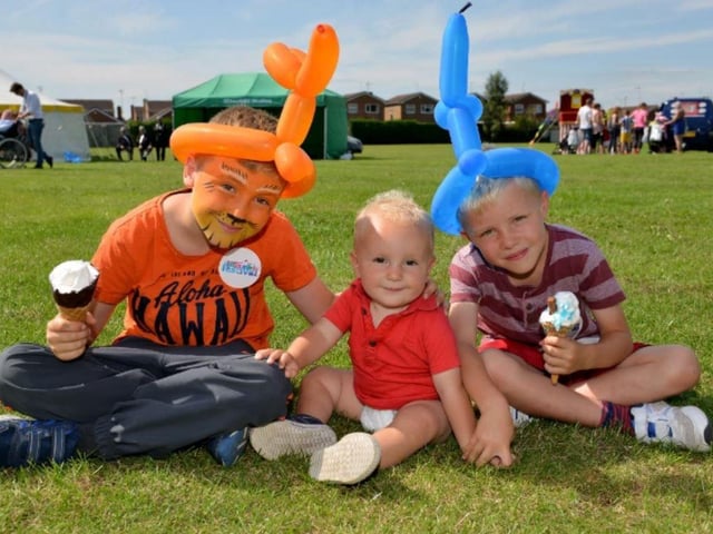 Enjoying an ice cream at the Mansfield Summer Festival at Carr Lane Park, Warsop are Mason Fox, Denver Fox and Braedan Fox.