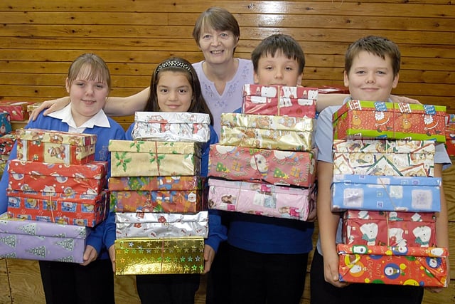 Pupils at Sutton's Dalestorth Primary School collecting parcels for the Operation Christmas Child appeal.
Over 60 parcels have been collected for the project. run by the Samaritan's Purse project.
Collecting the boxes was organiser Christine Foster.