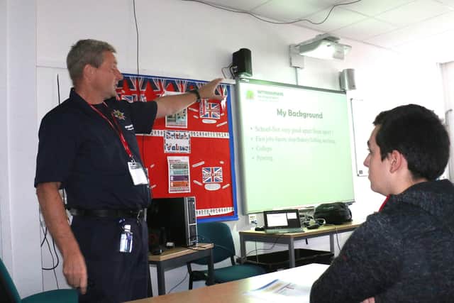 Nottinghamshire firefighter Craig Langton spoke to students about his career in the service