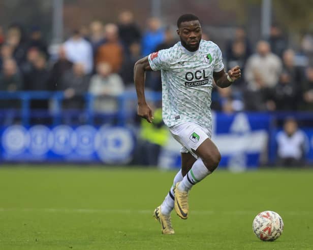 Mansfield Town defender Deji Oshilaja (23) during the Emirates FA Cup first round between Curzon Ashton FC and Mansfield Town FC at the Tameside Stadium, 03 Nov 2024, Photo Credit Chris & Jeanette Holloway, The Bigger Picture.media