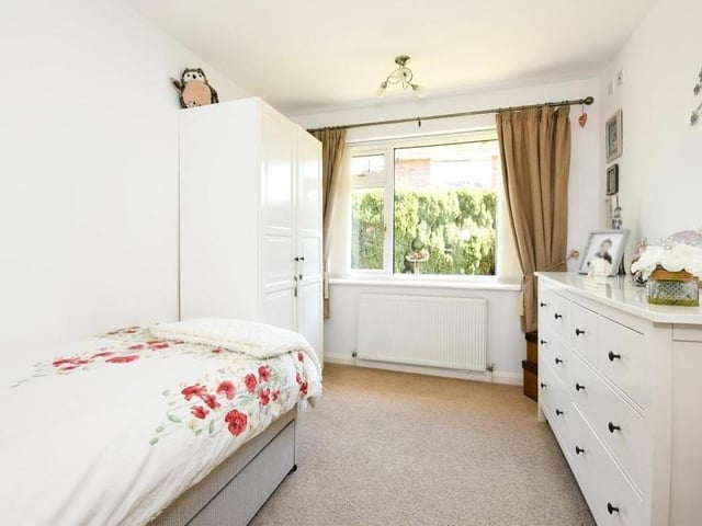 The third bedroom is a single but still attractive and offering lots of space for cupboards, wardrobes or drawers. The window faces the side of the property.